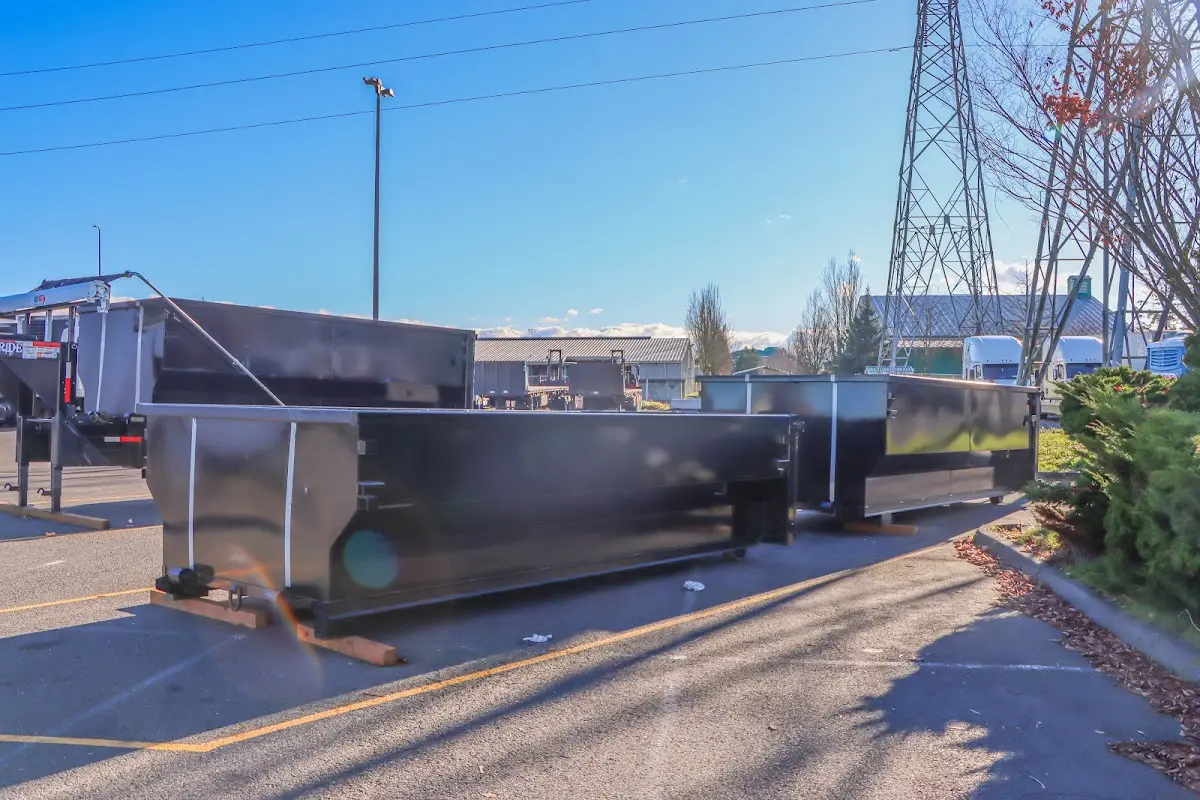 Roll-off dumpster ready for waste disposal at job site for Construction Dumpster Rental in Wharton